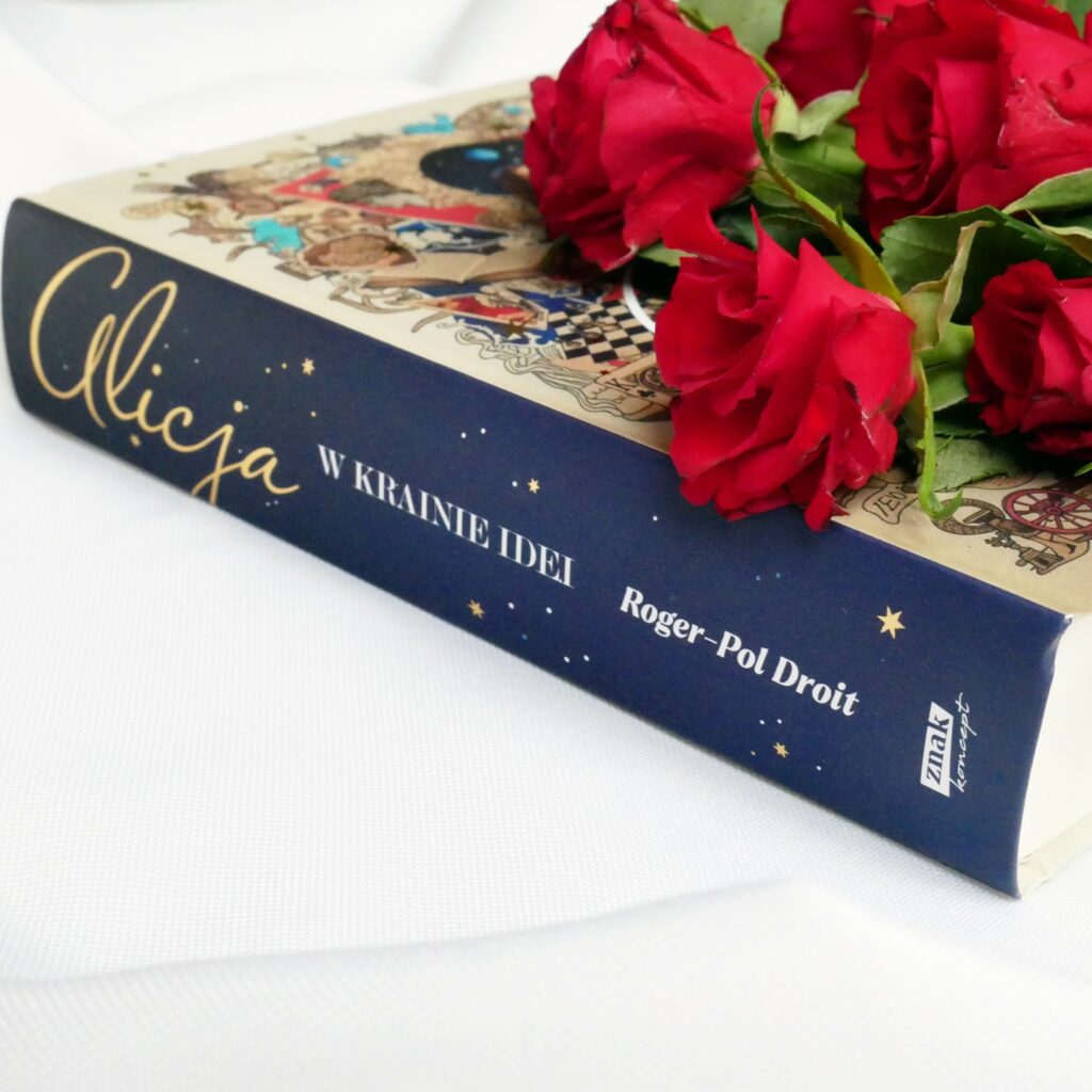 Grzbiet i okładka książki „Alicja w Krainie Idei” Rogera-Pola Droita z czerwonymi różami w tle.
